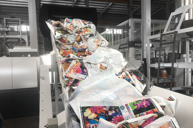 recycling machine for heavily-printed plastic bags